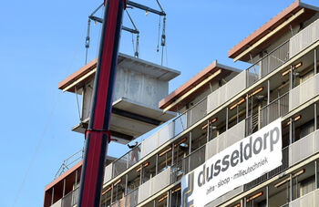 Uitgehesen delen van flat hergebruikt voor expogebouw