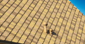 Dakpannen als blaadjes aan de boom